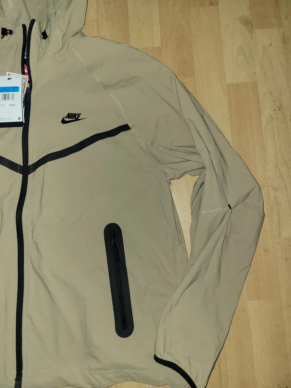 Nike Men’s Hooded Windbreaker Jacket in Tan with Black Accents